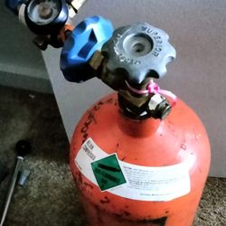 Helium tank with valve pressure gauge, inflater nozzel and assorted mylars