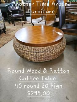 Coffee Table round wood WickerWe are located at 2811 East Bell road. Another Time Around Furniture.