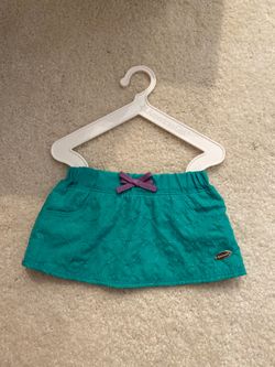American girl doll skirt hanger is included!