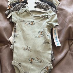 Pack of newborn bodysuits