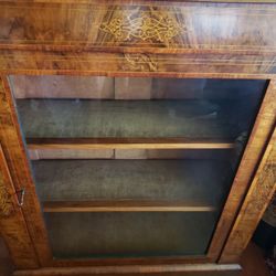 Beautiful vintage wooden display cabinet with door and key