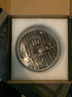 5 3/4” OEM Harley Davidson headlight