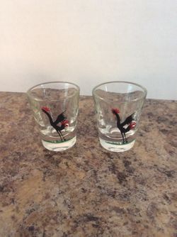 Two mid century modern Federal Glass rooster shot glasses