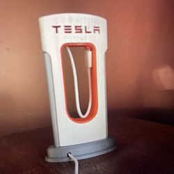Tesla supercharger, phone charger iPhone, or android