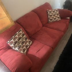 Long Sofa, Short Sofa, And Picture Frames