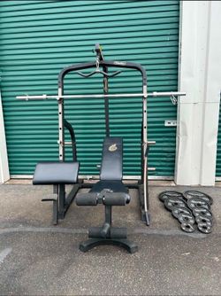 Nautilus Gym Squat Rack Weights Bars and Weights Bench