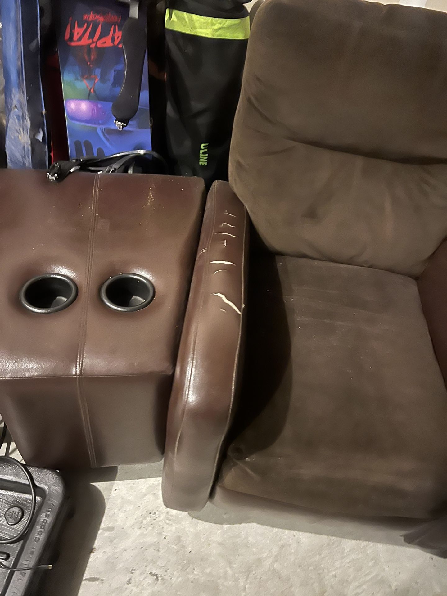 Set Of Two Brown Reclining Chairs With The Two Side Piece Tables With Two Drink Holders