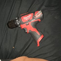 Milwaukee 12volt Drill ,Charger, And Battrry