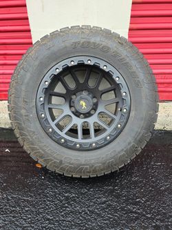 17" Black 6-Lug Wheel & Toyo Open Country A/T Tire – 265/70R17