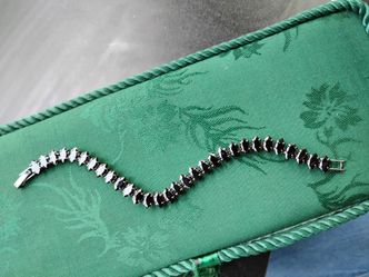 Marquise-cut black diamond tennis bracelet set in rhodium