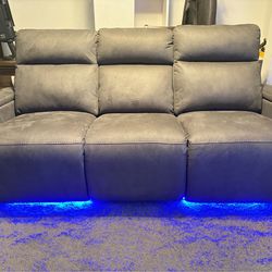 Power reclining sofa