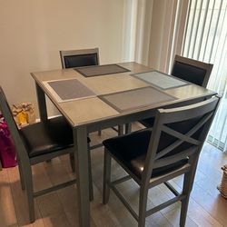 Dining room with 4 high chairs-gray