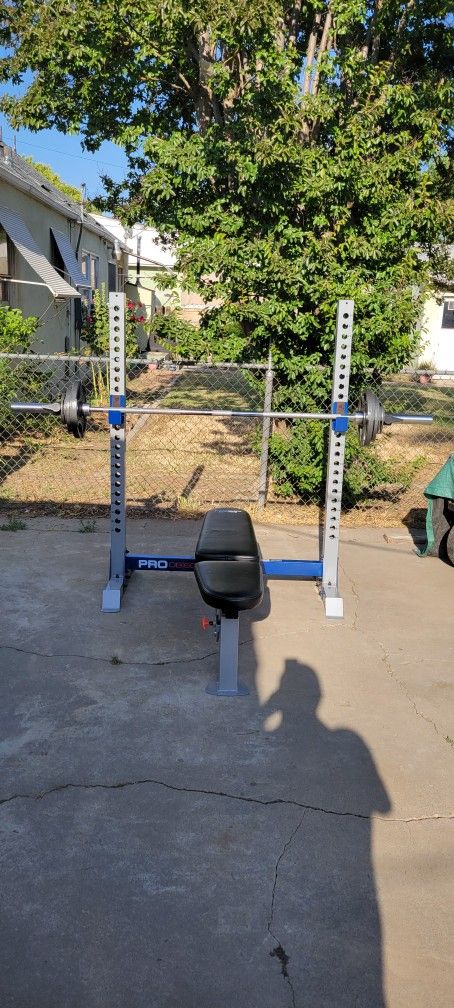 Incline/Decline Bench/Rack+7 ft Barbell +25s, 10s, (4)2.5s