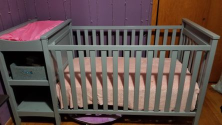 Crib with changing table