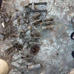 These are various metal fence fittings and hardware, likely for chain-link fencing.