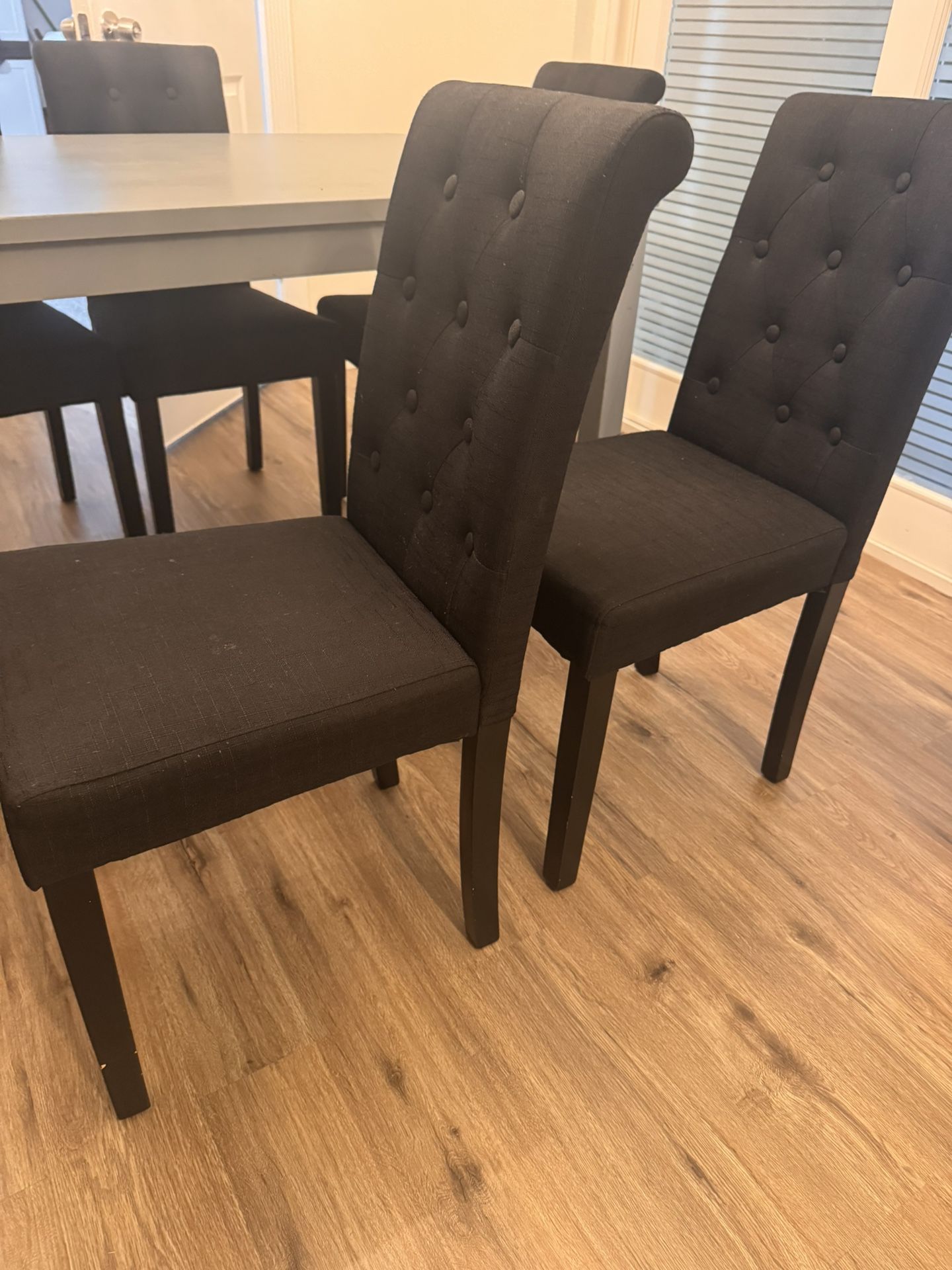 6 black chairs in good condition