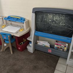 Step 2 desk and jumbo chalk/white board as it