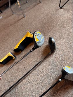 3 golf clubs, drivers and wood
