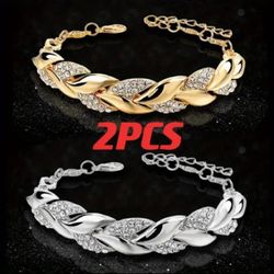 **Elegant Crystal-Adorned Leaf Twist Bracelet**
