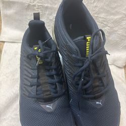 PUMA Voltaic Evo running shoes in a navy blue.