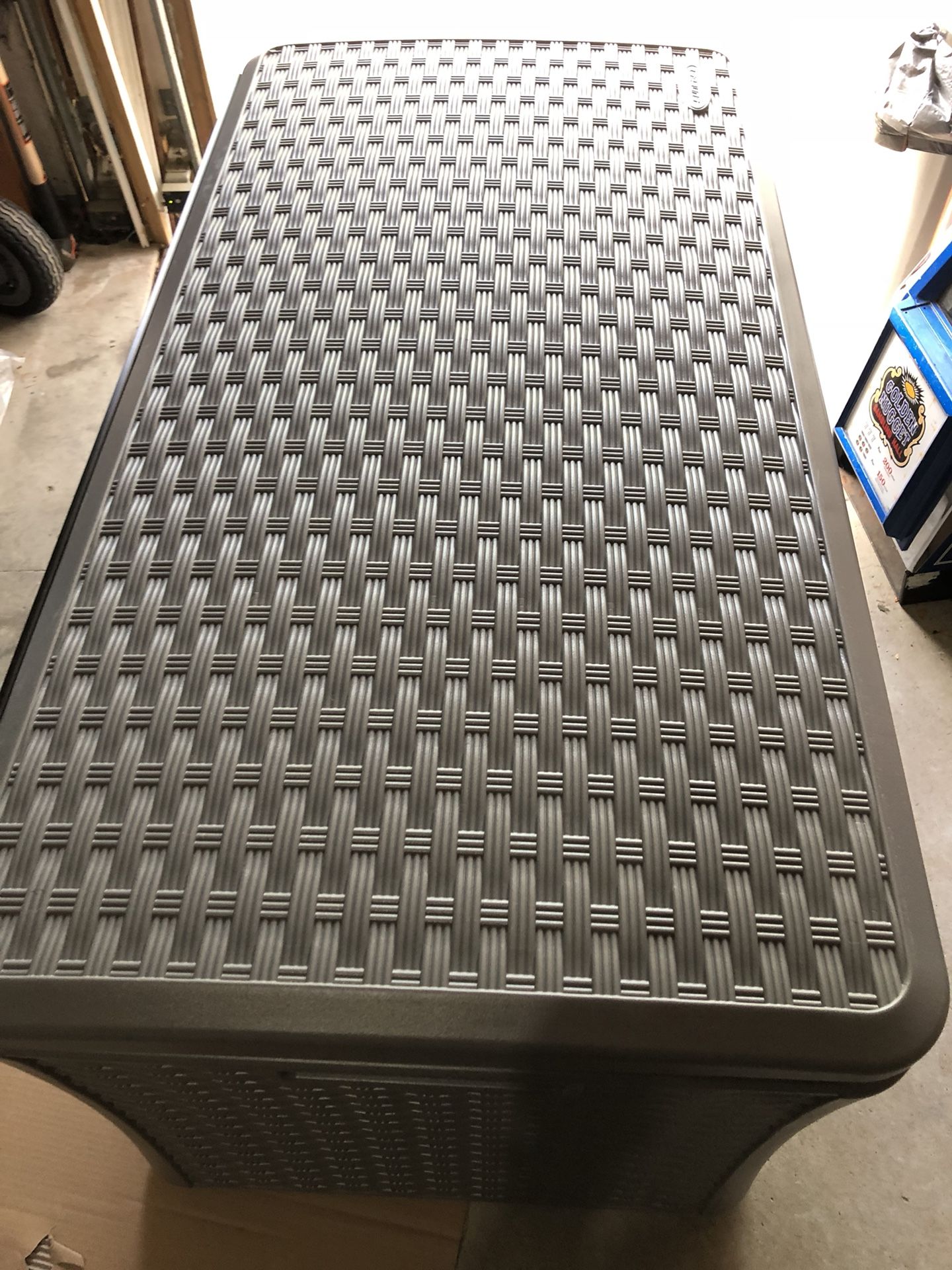 Suncast 134 gallon extra large deck box (new )already put together model BMDB13400ST 54 inches long 26 high 29 wide light gray