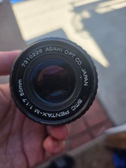 Camera lens and flash
