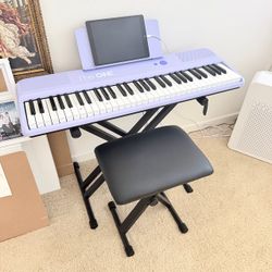 Piano with stand and chair