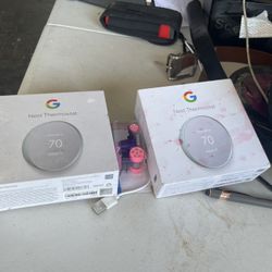 2 Google Nest Thermostats 