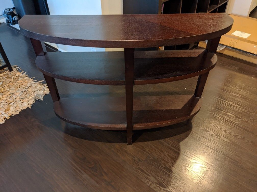 Crate & Barrel wood crescent shelved console table