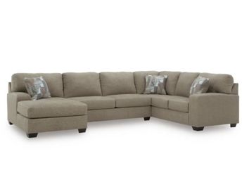 New in box Ashley furniture sectional