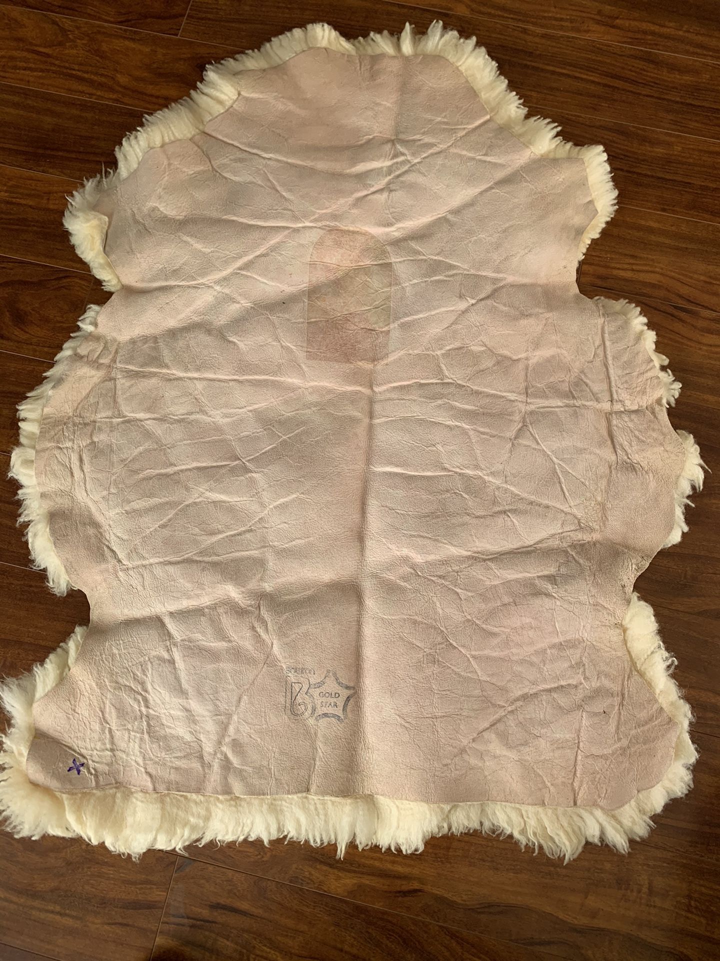 Sheep skin 34” long x 31” wide
