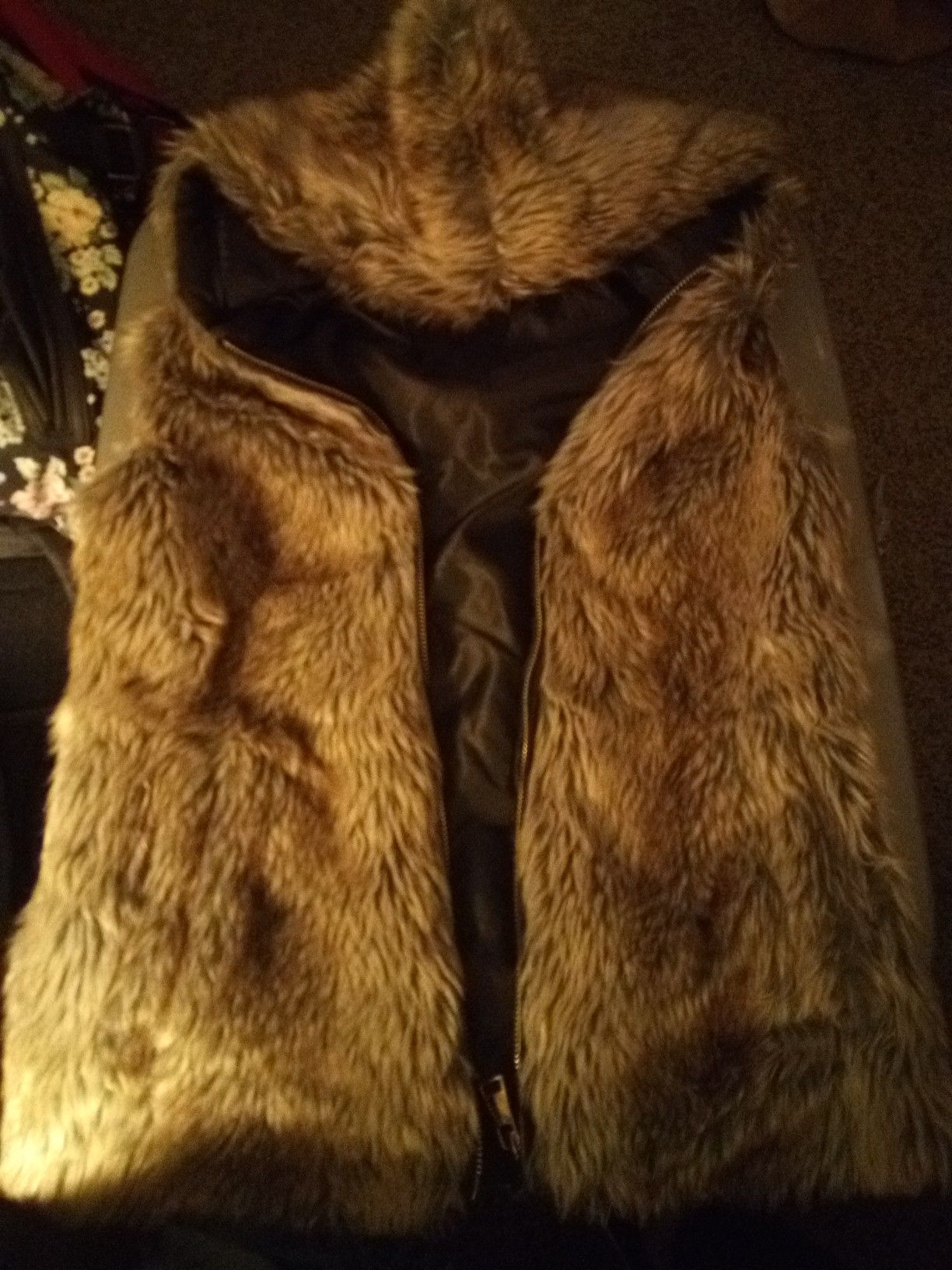 Woman's brown fur sleeveless zipup jacket