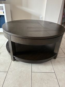 round lift-top coffee table