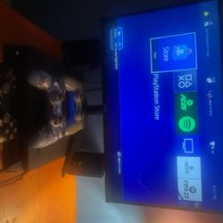 Ps4 set up with monitor and three controllers 