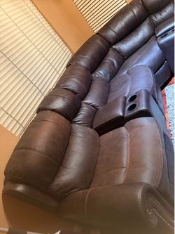Leather reclining sectional sofa