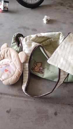 Pooh bear diaper bag plus head rest
