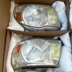 OEM Tacoma Headlight Covers 