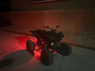 Black ATV Four Wheeler with LED Underglow