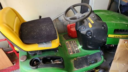 John Deer Riding Lawnmower.