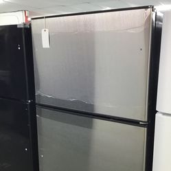 New Scratch And Dent GE 21 Cu Ft Black And Stainless Steel Top And Bottom Fridge.  1 Year Warranty 
