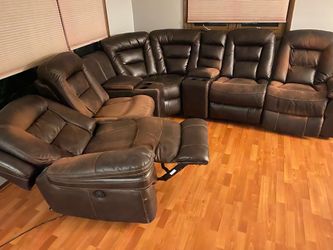 Leather sectional couch with power recliners
