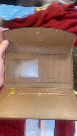 Authentic Louis Vuitton Ebene Rose Ballerine Caissa Wallet for Sale in  Dallas, TX - OfferUp