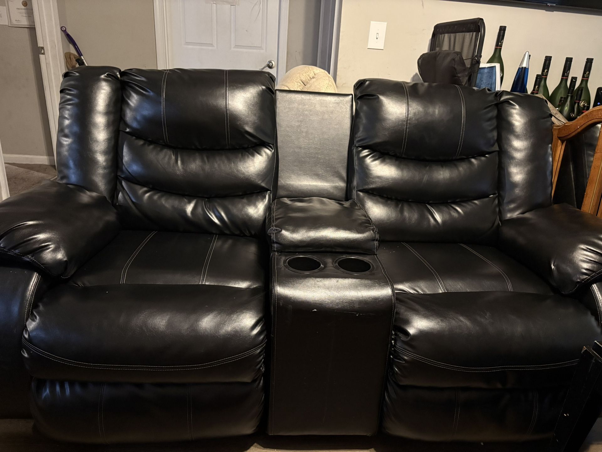 Two Black Leather Sofas