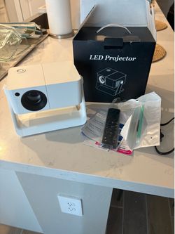NEW 1080P LED Mini Projector with WiFi and 500 ANSI Lumens