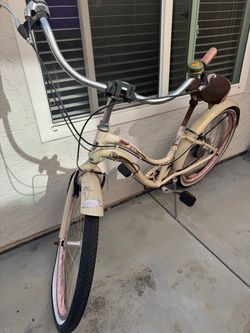 Cream Beach Cruiser Bicycle with Pink Accents