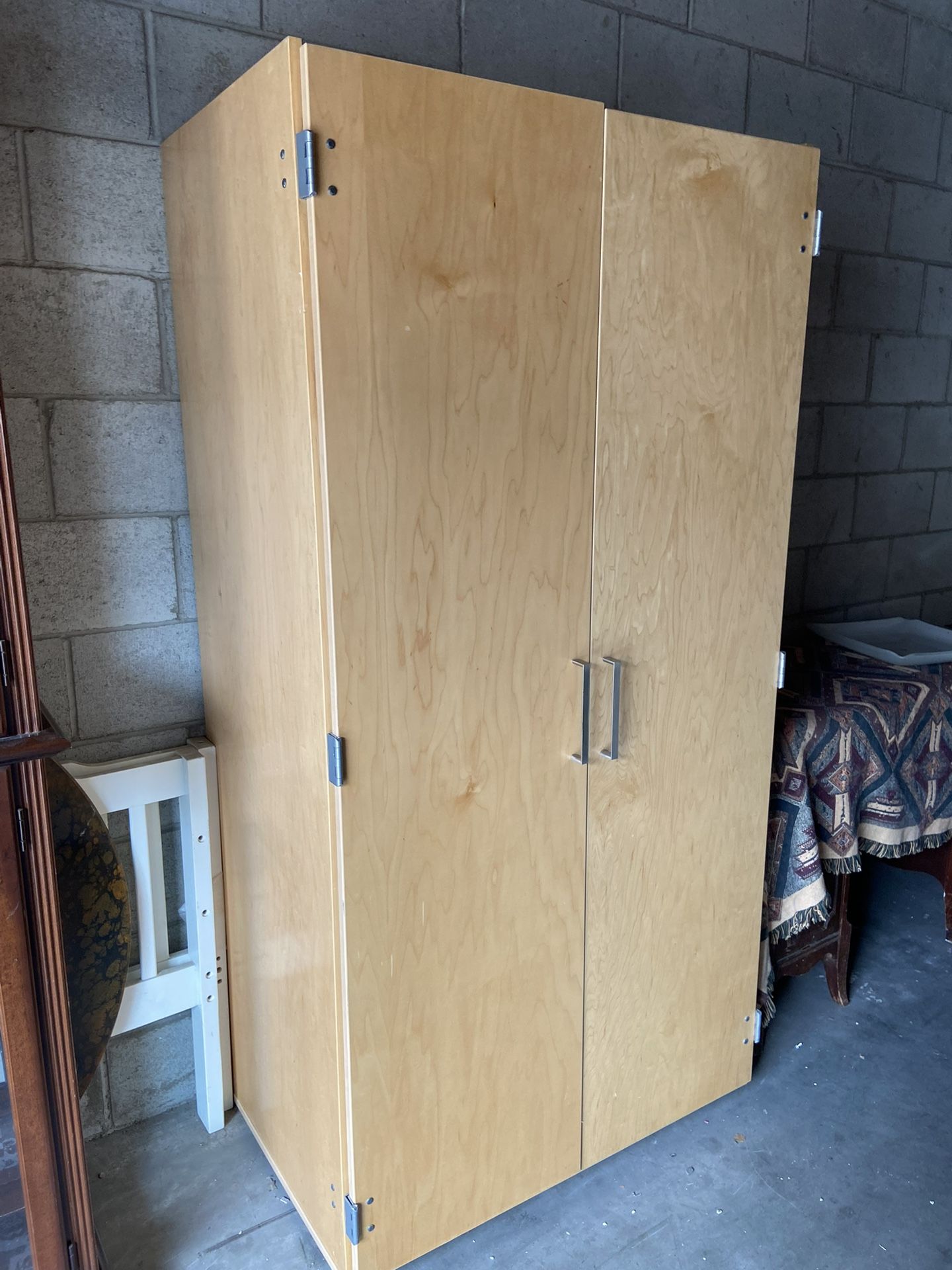 Clothes Cabinet Shelf The dimensions are 24 deep 36 wide and 6 feet tall