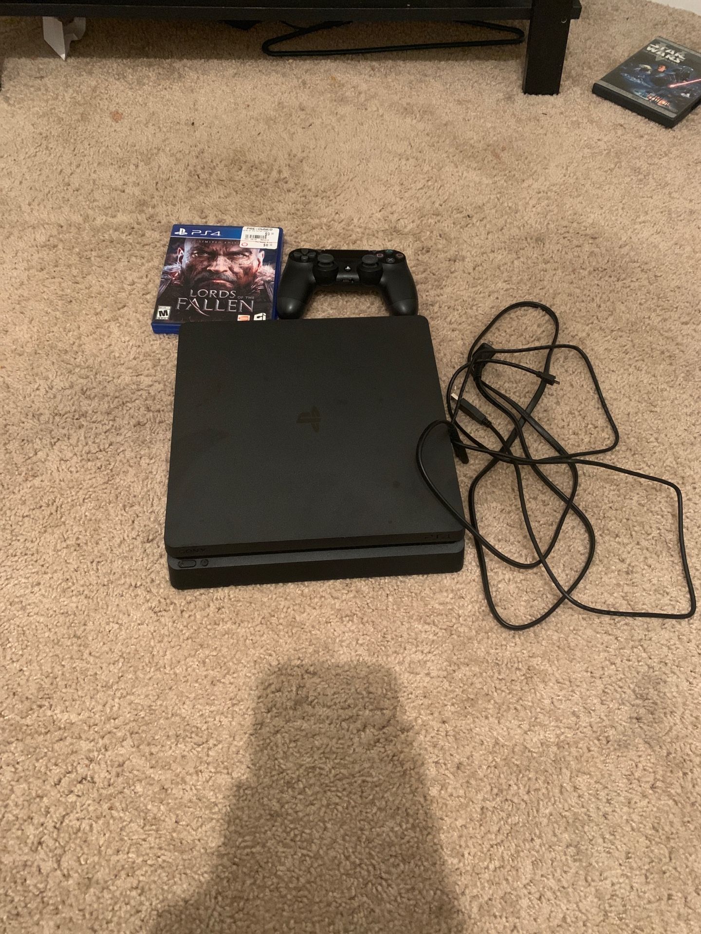 PS4 500 GB, black controller, 1 game.