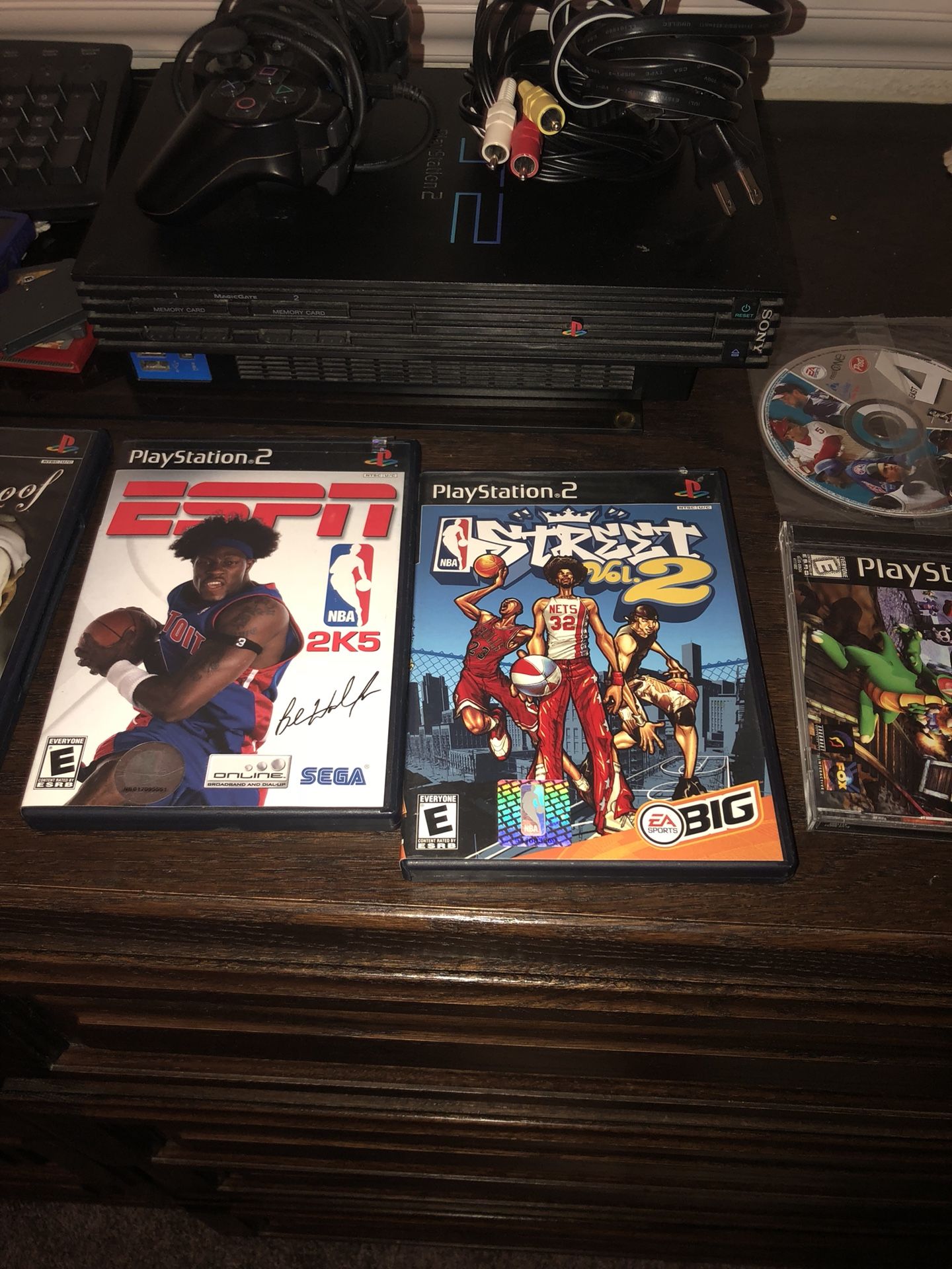 $250 OBO. PLAYSTATION 2 INCLUDES TV CABLE CONNECTOR & GAME CONTROLLER PLUS 5 GAMES
