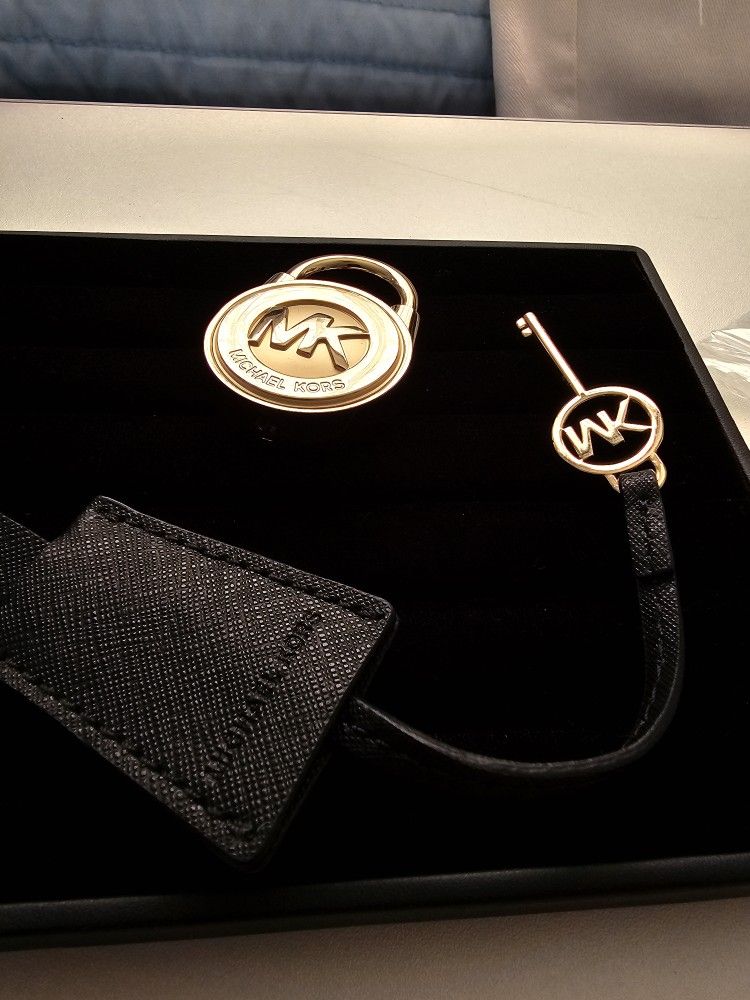 MK Golden Lock and leather hanger with key