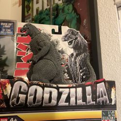 The image displays a Bandai Godzilla 1954 60th Anniversary figure, a collectible vinyl figure from the Bandai Creation line.  Design: Features the cla